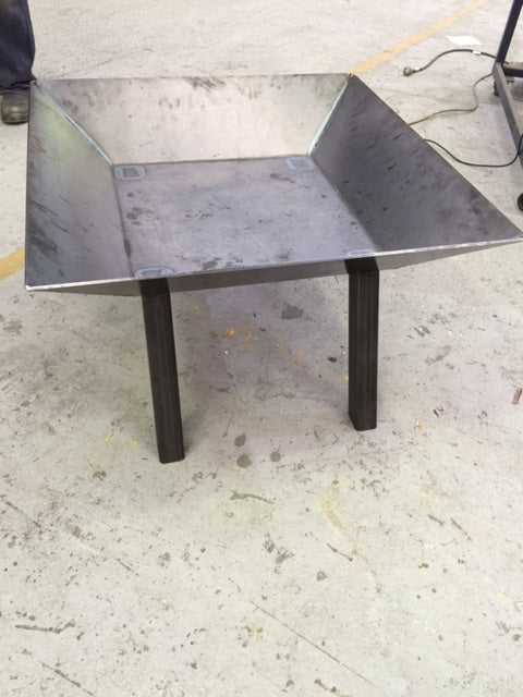 Catten Industries factory manufacturing fire pit work in progress