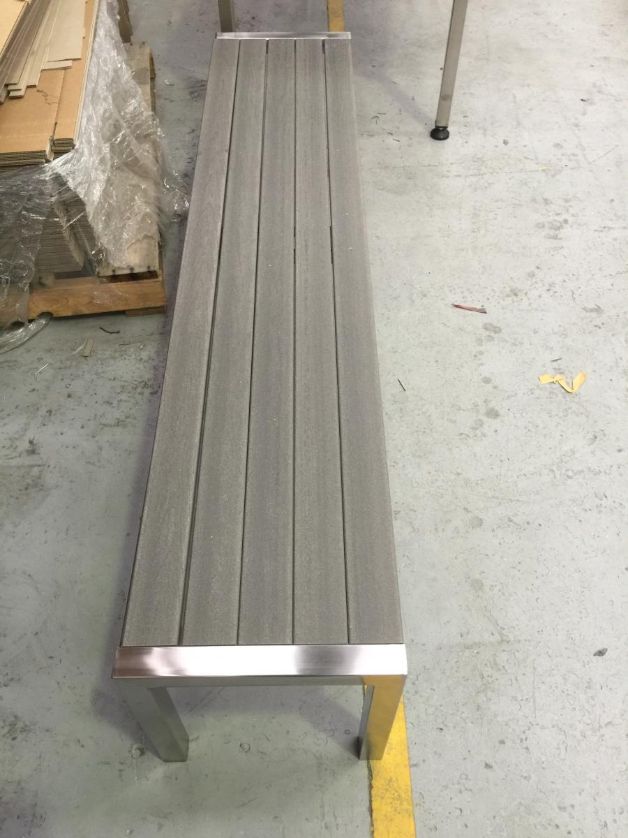 Catten Industries factory completed  stainless steel frame with ModWood Silver Gum seat outdoor bench
