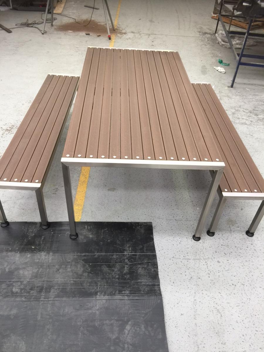 Catten Industries factory completed  stainless steel frame with ModWood Black Bean outdoor table and bench set