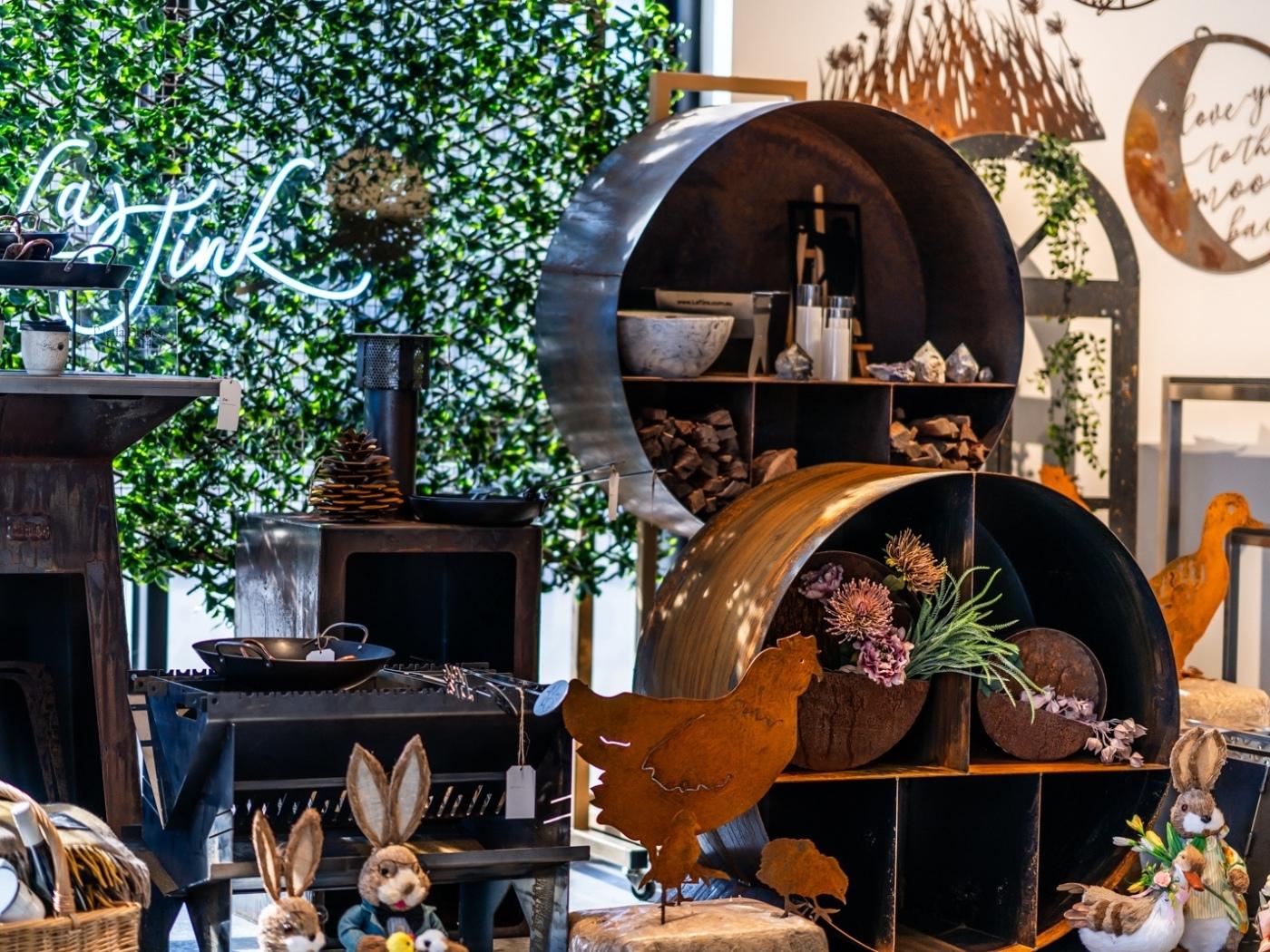 LaTink showroom featuring Corten steel wood stackers and burners 