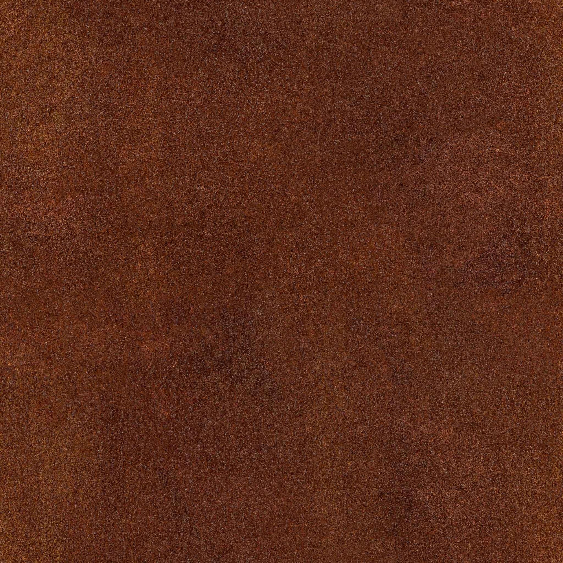Weathered dark brown rust Corten steel material sample close up texture